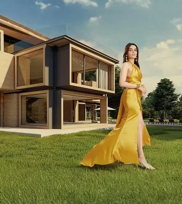 Luxury real estate promotion by Neworld Developers featuring a modern villa and an elegantly dressed woman in a golden gown, symbolizing premium lifestyle and elegance.